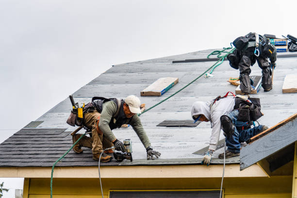 Professional Roofing technician working in Little Compton, RI